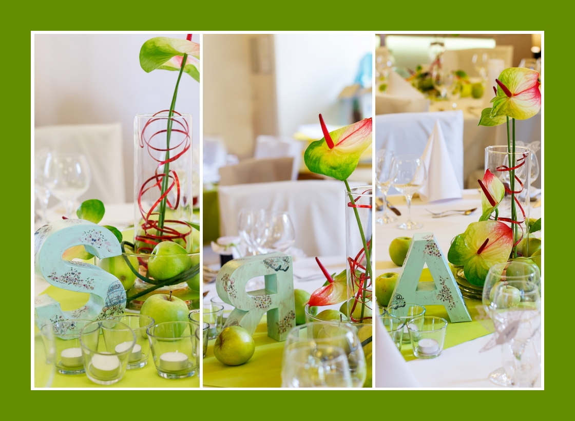 Tischdeko mit grünen Tischläufern, weißen Servietten und vielen Dekoaccessoires
